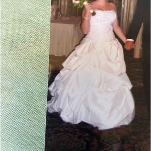 Wedding gown, perfect condition, cleaned and preserved, sequined bodice. Bustles